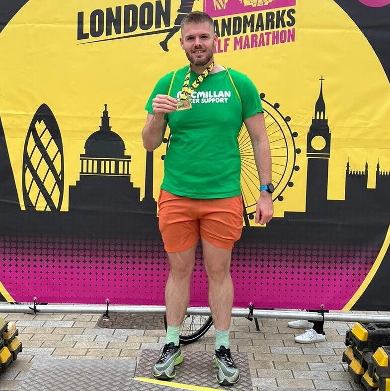 Matt, a white male in green Macmillan t shirt and running shorts.