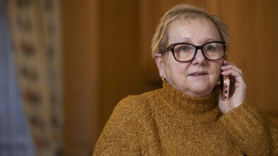 Woman talks on mobile phone