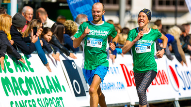 Two Macmillan runners near the finish line