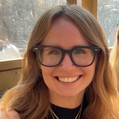 Photo of Rosalia, Senior Innovation Manager. She is looking directly at the camera and smiling.