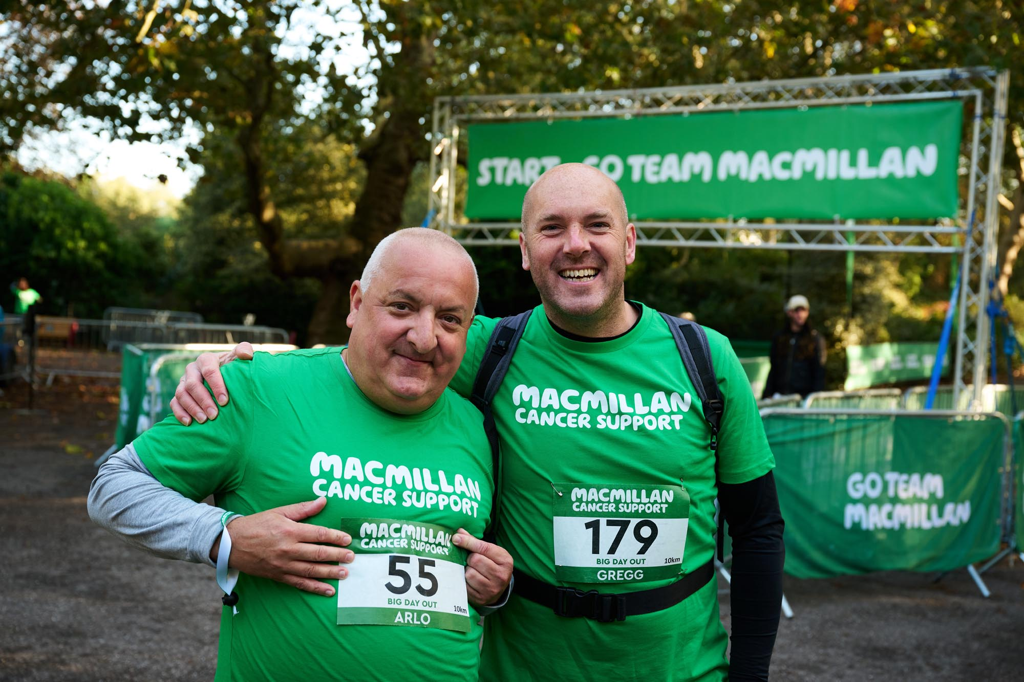 Arlo and Gregg wearing their Macmillan t-shirts near the start line