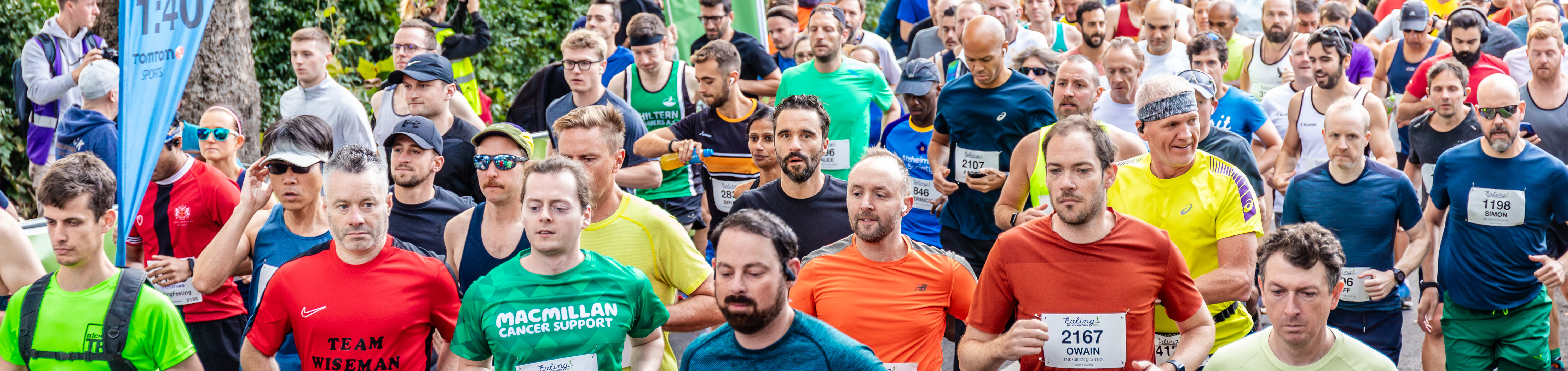 Crowds of people running at the start of Ealing Half Marathon