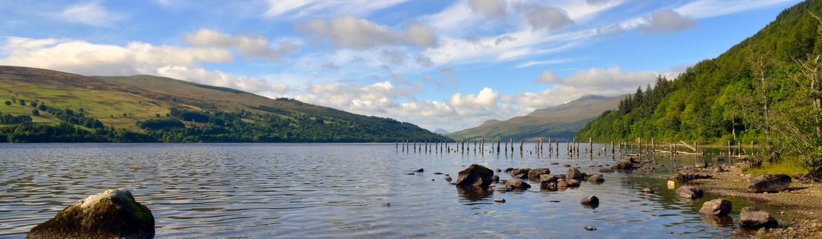 An image of Loch Tay, advertising the Go Swim Loch Tay 2024 event.