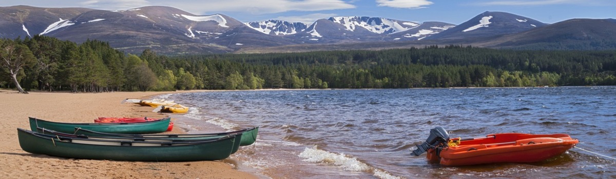 An image of Loch Morlich, advertising the Go Swim Loch Morlich event.
