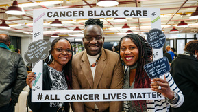 3 black people gathering with Cancer Black Care charity. 