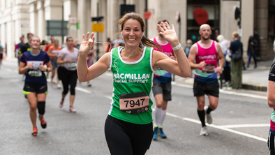 Woman running at London Landmarks for Macmillan