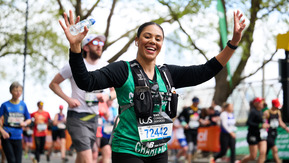 A woman running the London Marathon 2024