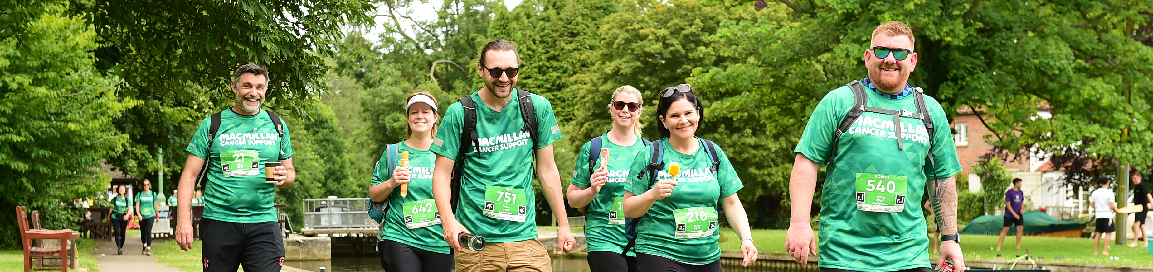 Mighty Hikers walking next to a river