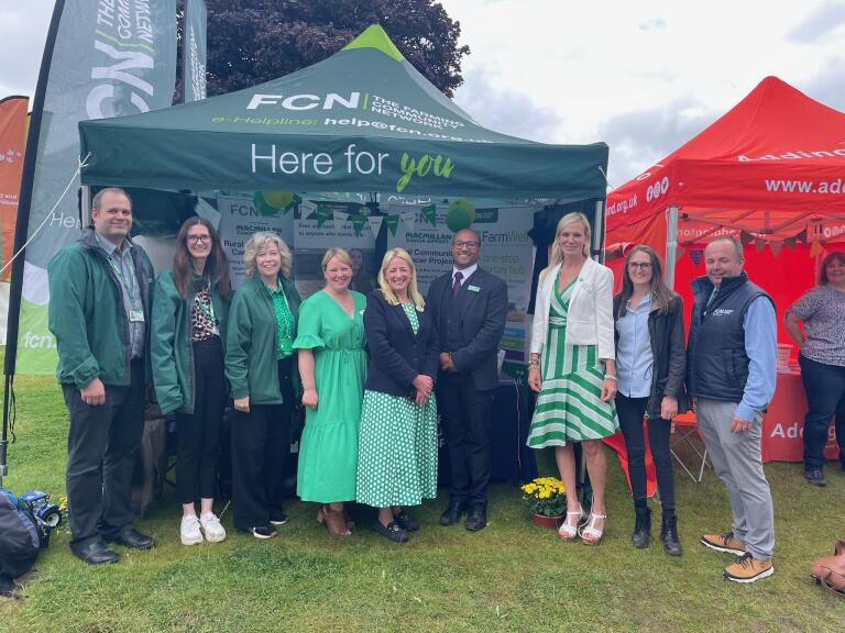 A small group of people from Macmillan Cancer Support and the Farming Community.