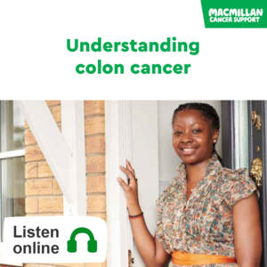 Woman standing by her front door smiling