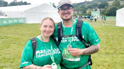 Andi showing off finisher's medal