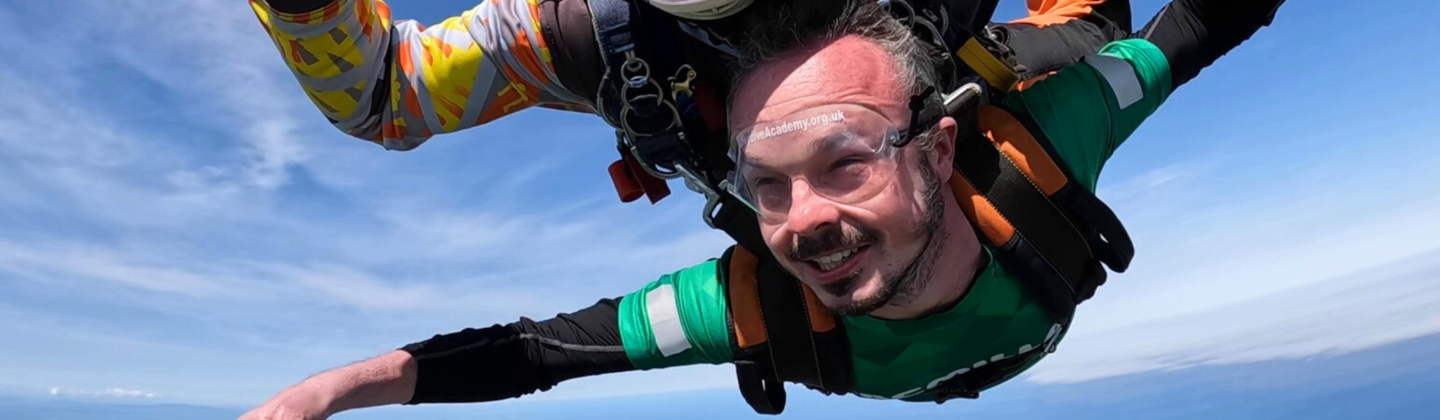 People doing a tandem skydive
