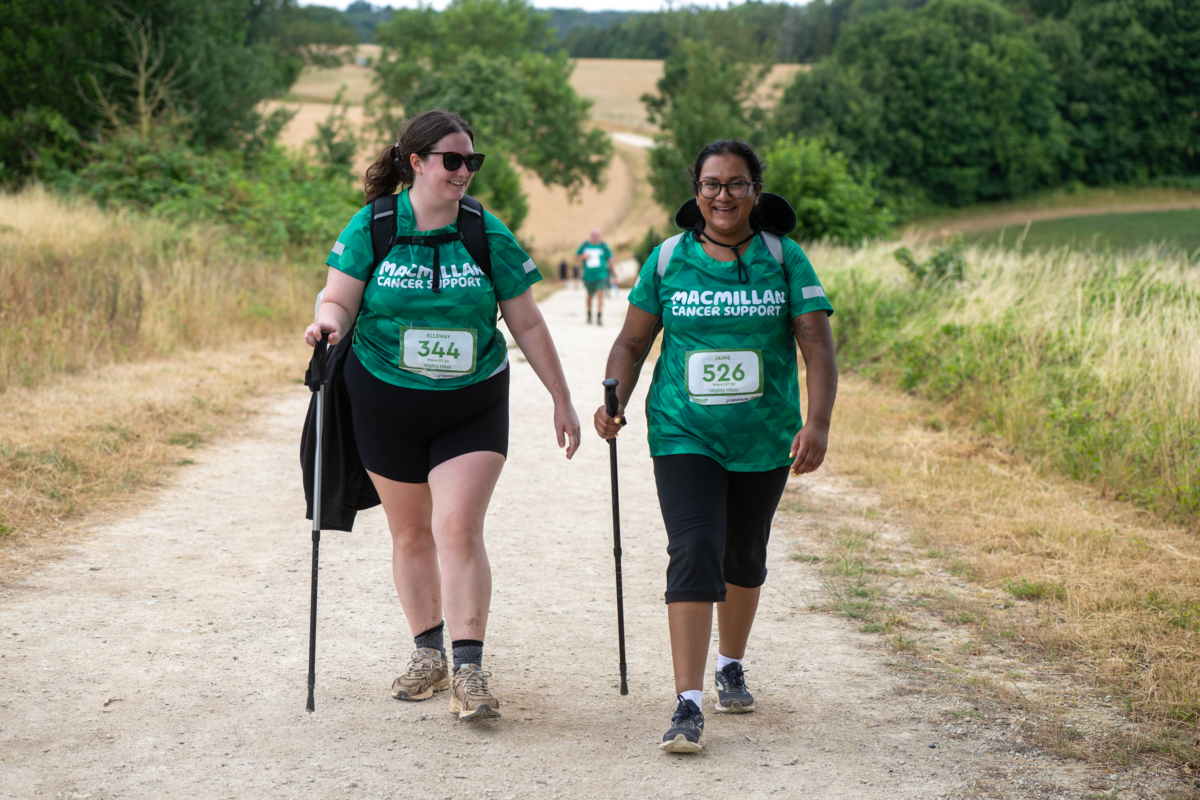 Two Mighty Hikers walking up a hill
