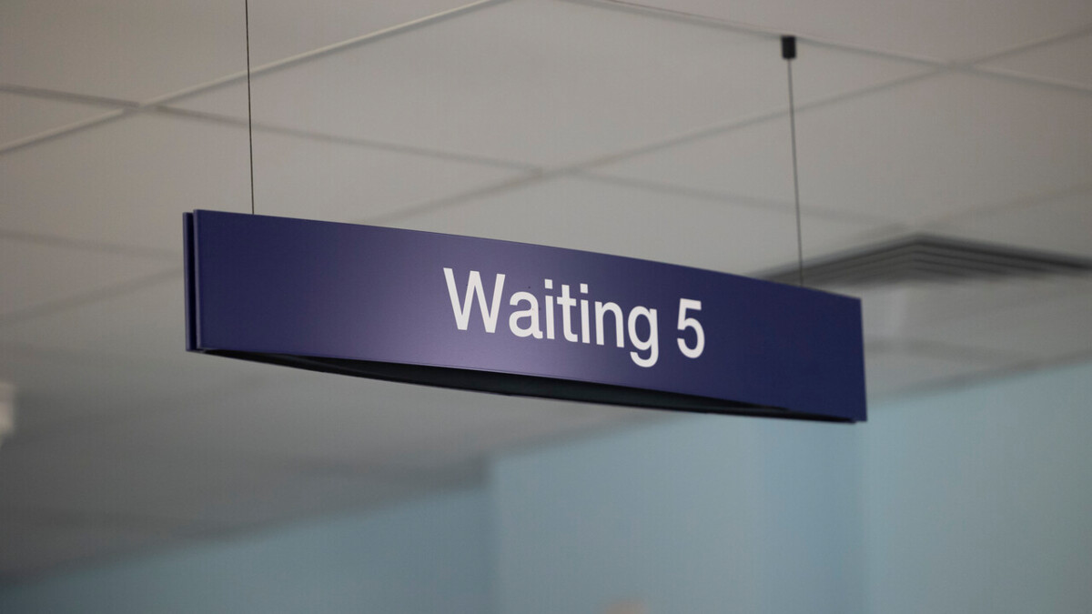 A sign for a hospital waiting room.