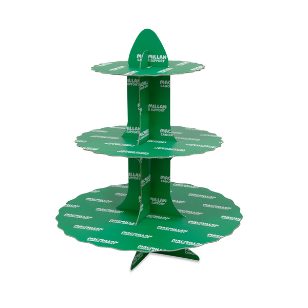 A three tiered green cake stand with Macmillan branding on it.