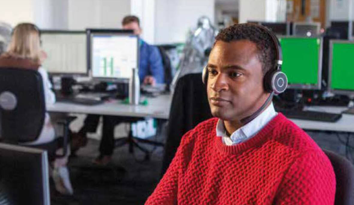 The cover for the Help With The Cost of Cancer audiobook. It includes the title of the audiobook, Macmillan Cancer Support's logo and an image of a Macmillan Cancer Support money adviser working.