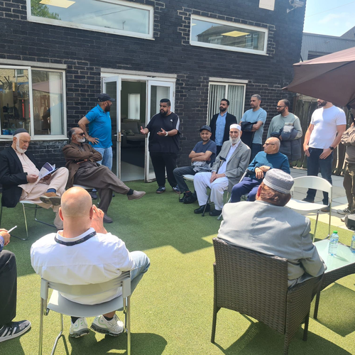 A group of people talking part of Calderdale Cancer Champions.