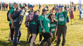 A Mighty Hiker taking a selfie of his Mighty Hike team