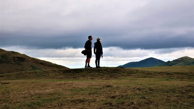 A couple of people at the top of Worcestershire Beacon