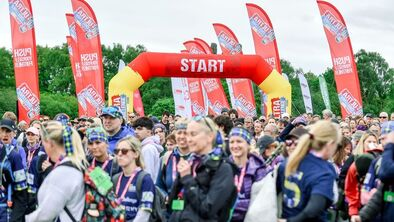 Lots of people gathered at the start of an Ultra event