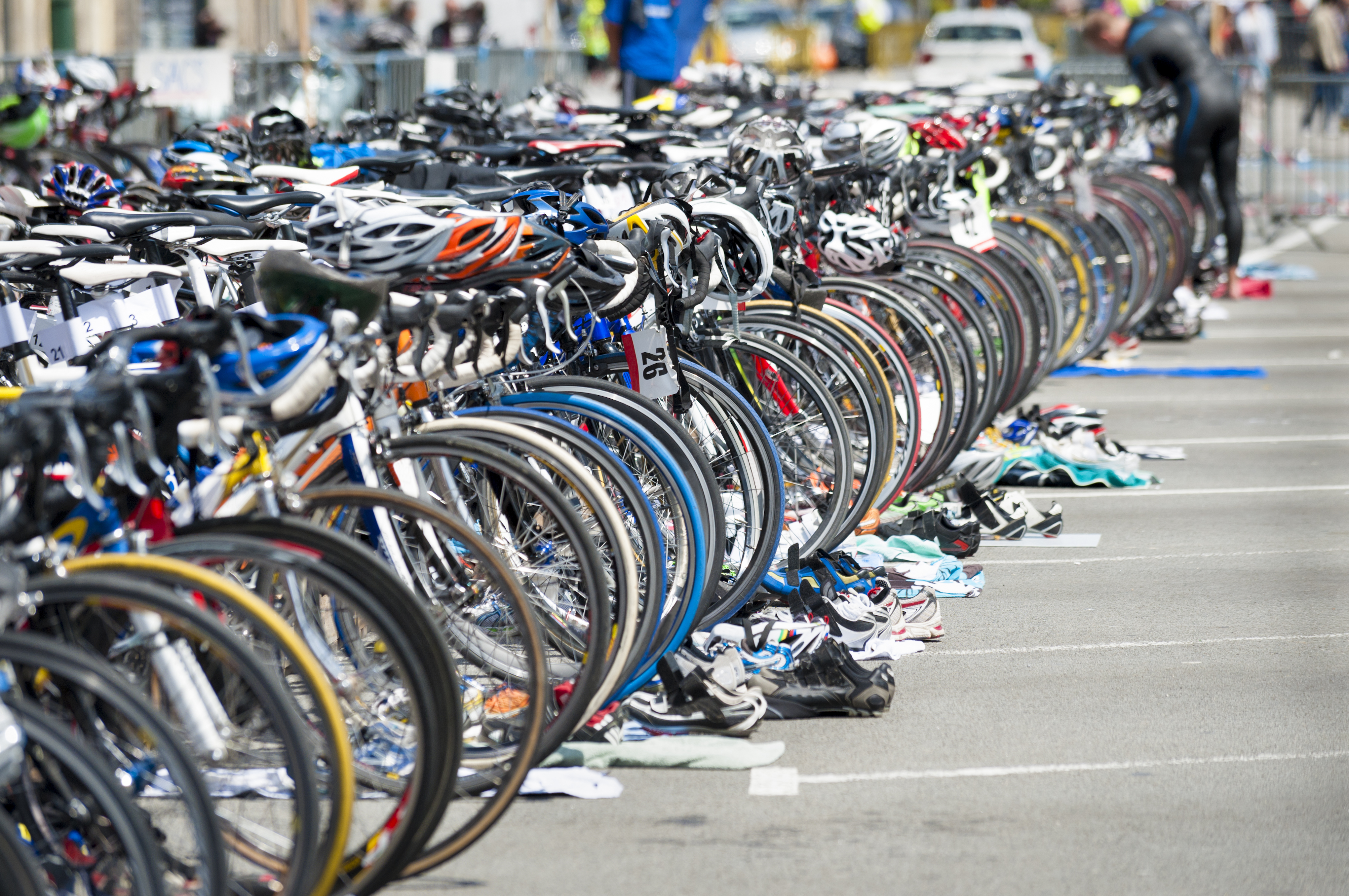 A rack of bikes lined up at a triathlon