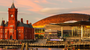 A Cardiff cityscape with the Pierhead building in the centre.