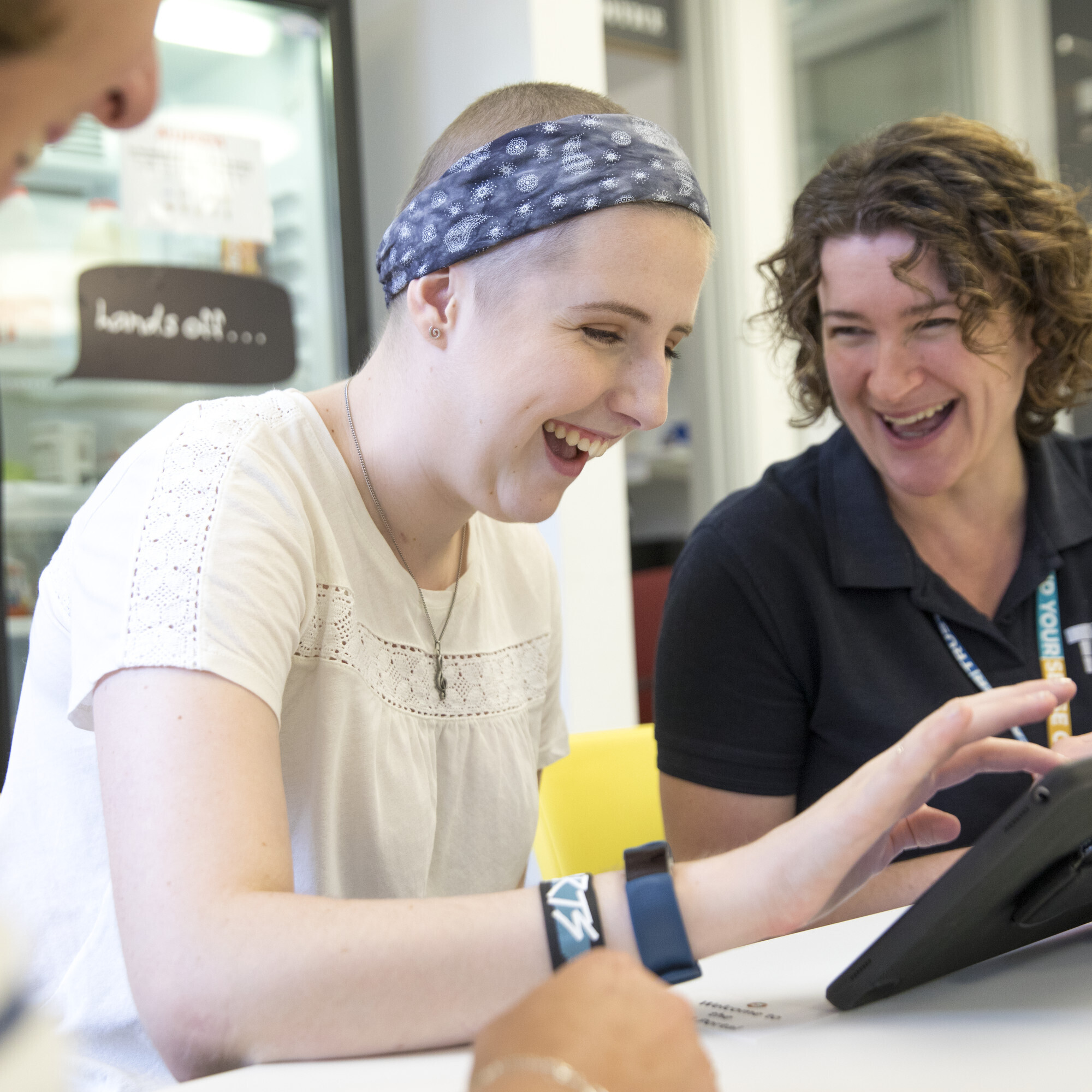Macmillan Professional using an iPad/tablet with a patient