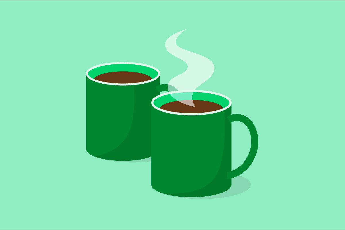 Two dark green mugs on a light green background.