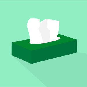A box of tissues on a light green background.