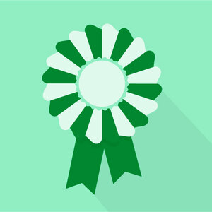 A dark rosette on a light green background.