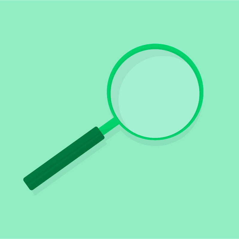 A magnifying glass on a light green background.