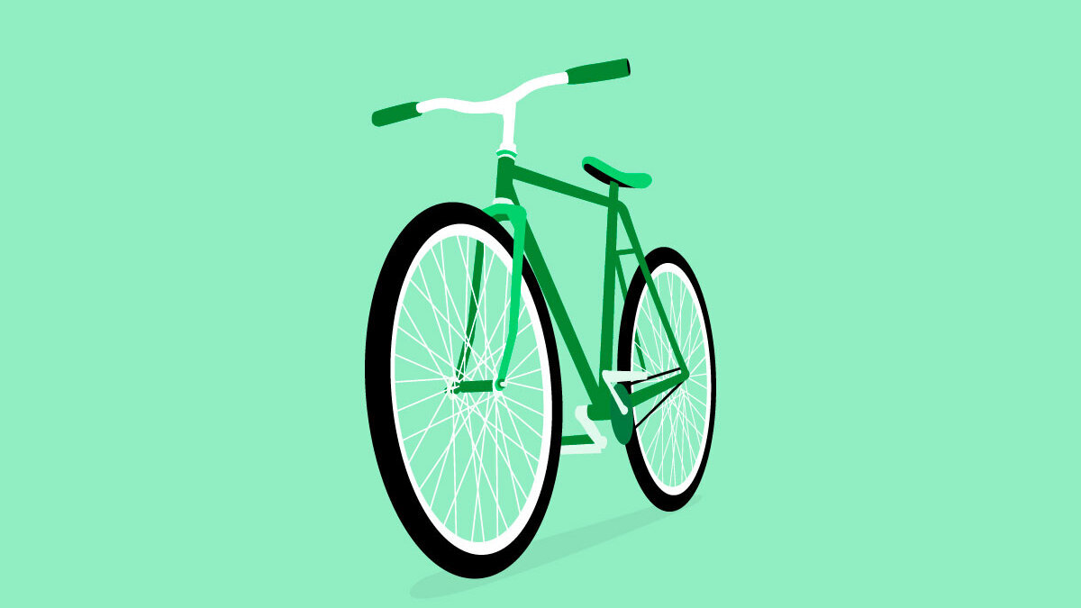 A dark green bike on a light green background.