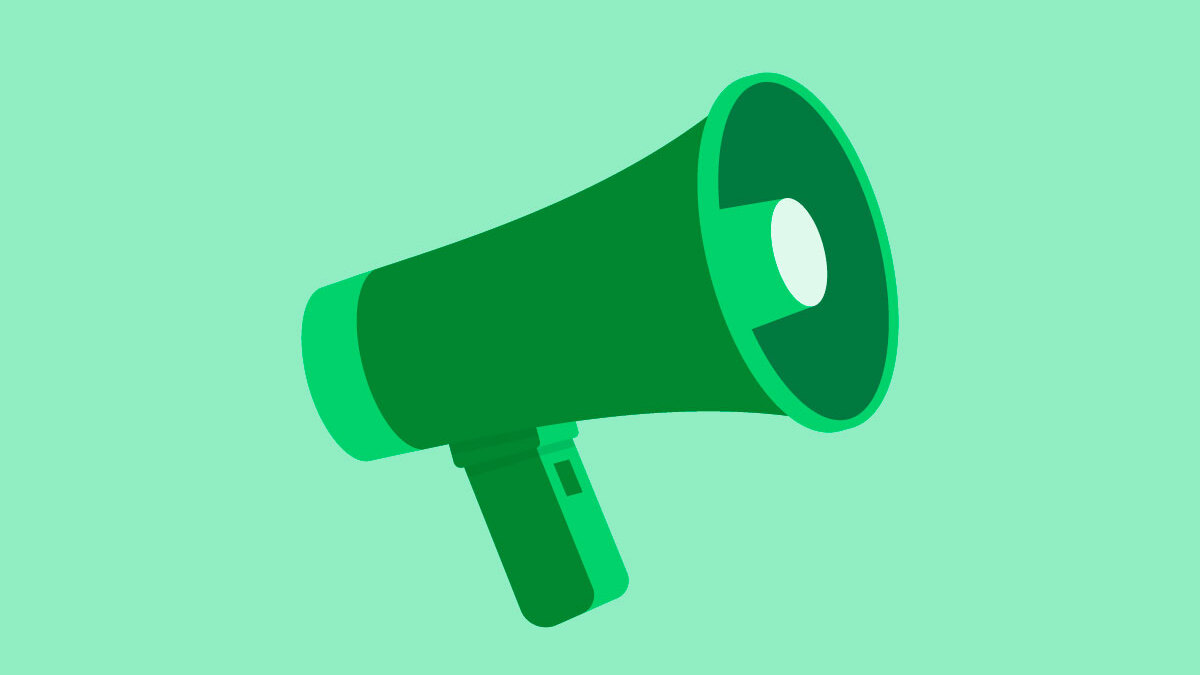 A dark green megaphone on a light green background.