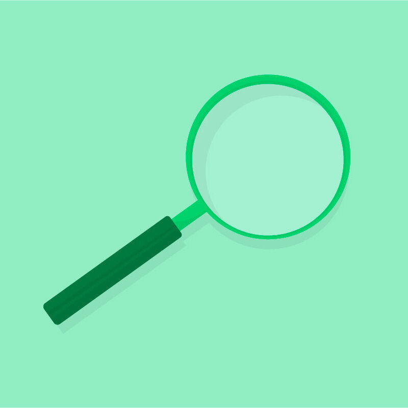 A magnifying glass on a light green background.