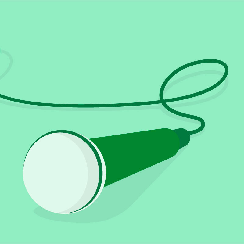 A dark green microphone on a light green background.