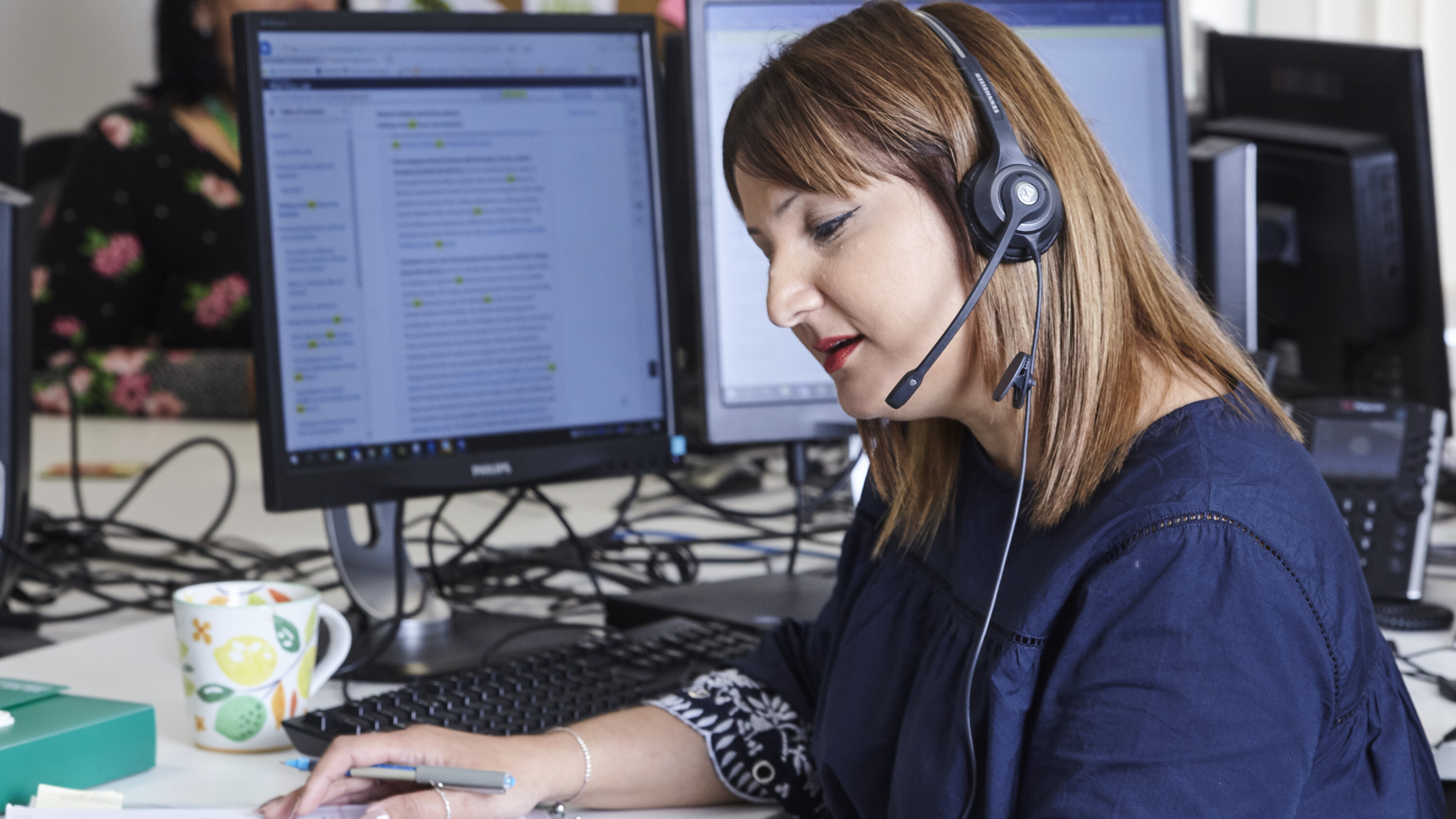 Portrait of Ghazala working in the Work Support Service Team in Shipley
