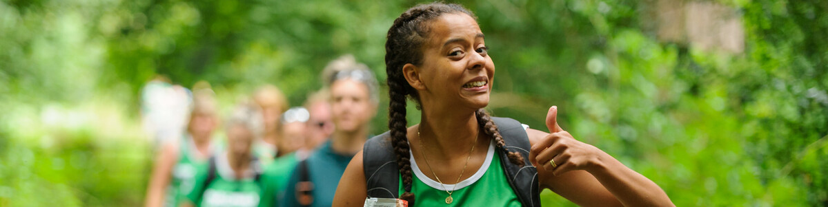 A hiker giving a thumbs-up at Wye Valley Mighty Hike