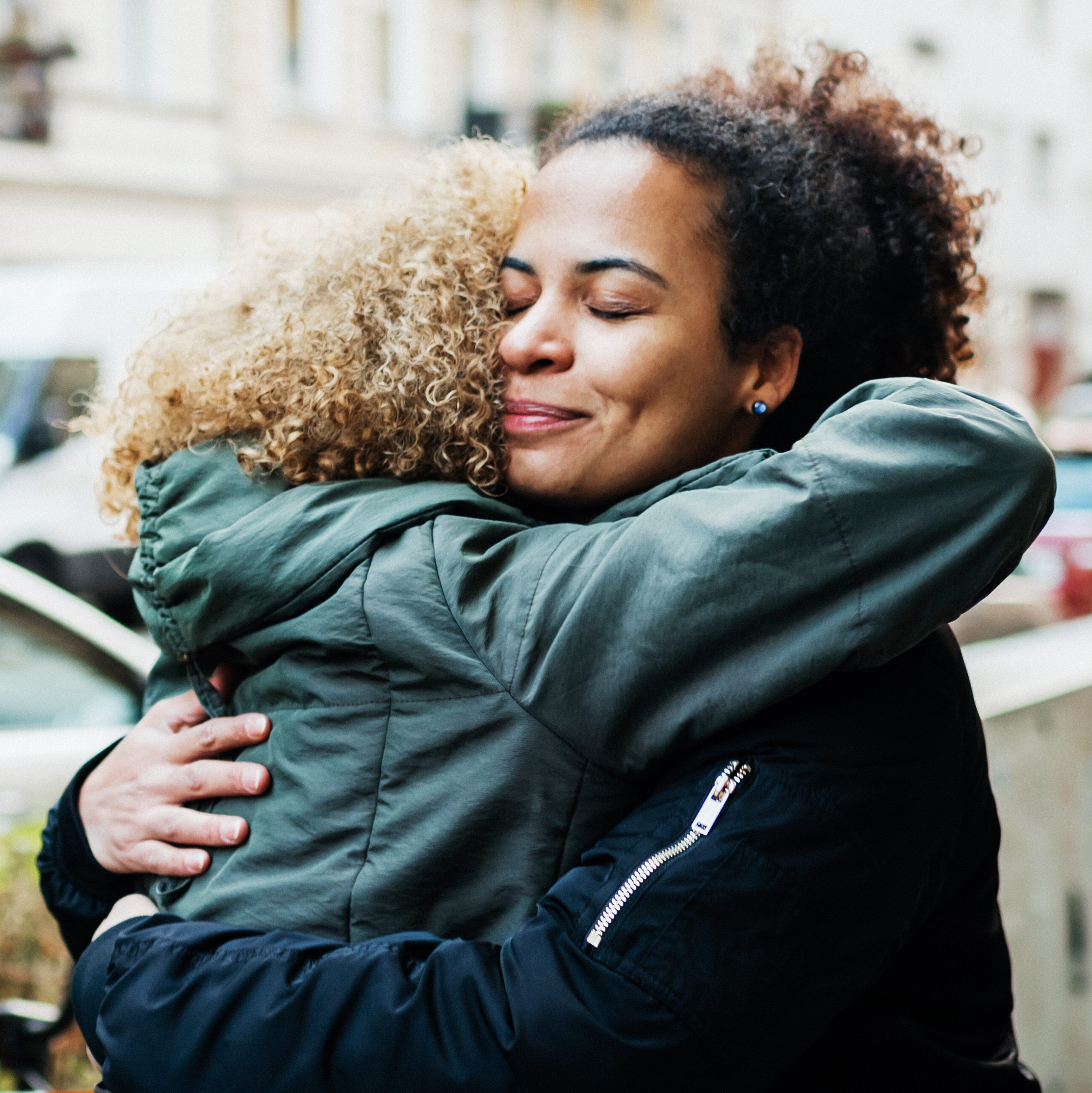 Two women hugging