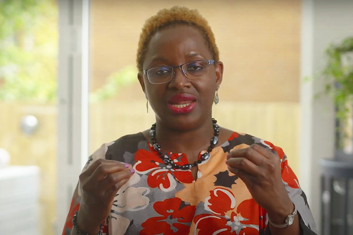 A screen capture of Bami talking about her breast cancer story. The photo is captioned 'Breast cancer is power'